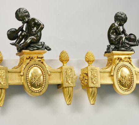 Andirons on gray background