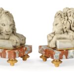 Dekoratives Paar liegender Löwen